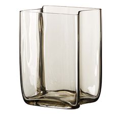 two clear vases sitting next to each other on a white surface with no one in it