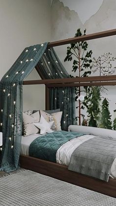 a bedroom with a canopy bed and green curtains on the window sill, next to a white dresser