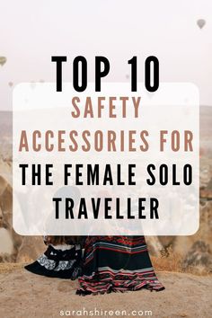 a woman sitting on top of a hill with the words top 10 safety accessories for the female solo traveler