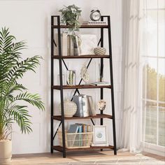 a book shelf with books and plants on it in a room next to a window