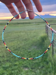 Wire choker in bright, western colors. Adjustable length and lobster claw clasp. Also comes in a string option. Seabeads Jewelry, Western Bracelets Cowgirl Jewelry, Country Bracelets, Western Chokers, Country Necklaces, Western Beaded Necklace, Western Colors, Western Jewelry Necklace, Sea Beads