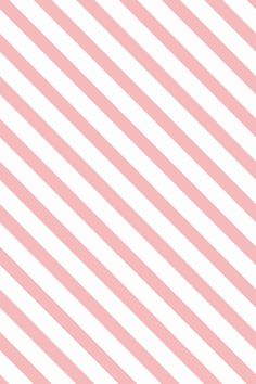 a pink and white diagonal striped background