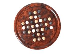 a wooden board game with white and black marbles in the middle on a white background