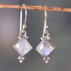 The ethereal light emanating from these diamond-shaped rainbow moonstones calls for harmony and serenity, blessing your days and ensembles. Present in Narayannii's sterling silver dangle earrings directly from India, the natural cabochons are enriched by a polished finish, making the design the perfect accent for casual or formal occasions. Hypoallergenic Silver Moonstone Jewelry, Silver Moonstone Birthstone Earrings, Silver Moonstone Earrings With Birthstone, Silver Birthstone Earrings With Moonstone, Bohemian Hypoallergenic Moonstone Jewelry, Spiritual Silver Moonstone Earrings, Spiritual Moonstone Jewelry With Matching Earrings, Ethereal Earrings, Ethereal Jewelry