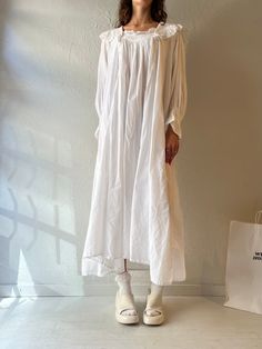 - Hopeless Romantic white long sleeve maxi dress - No fabric content tags but feels like 100% cotton - Tagged S Bust: 24" Length: 35.5" We are not responsible for lost, stolen, or damaged packages once they have been shipped. Any additional customs duties or taxes incurred on international orders are the responsibility of the buyer. Please note that our items are vintage and may have minor flaws or imperfections due to their age, which adds to their unique character. Billowy Cotton Dress For Fall, Billowy Cotton Long Sleeve Dresses, Billowy Long Sleeve Cotton Dress, Cotton Billowy Long Sleeve Dress, White Billowy Long Sleeve Maxi Dress, White Relaxed Fit Maxi Dress For Loungewear, Long Cotton Maxi Dress For Fall, Cotton Long Maxi Dress For Fall, Long Sleeve Cotton Maxi Dress For Loungewear