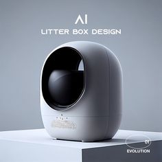 an electronic device is sitting on top of a white surface with the words, litter box design above it