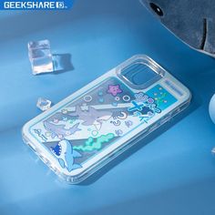 an image of a phone case on a blue surface with other items around it and a toothbrush