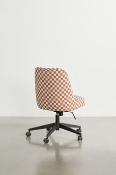 Topped in our favorite checkered motif, this desk chair infuses your workspace with a modern appeal that will leave you inspired every day. Equipped with a lift mechanism that allows you to adjust your seat to its desired height. Complete with a swivel base set on five wheeled legs so you can roll through your workspace. This custom furniture piece will be made to order just for you. Features Modern desk chair upholstered in our favorite checkered motif Equipped with a lift mechanism and a swive Desk Chair Aesthetic, Modern Desk Chair, Chair Aesthetic, Adjustable Desk, Modern Desk, Desk Chair, Upholstered Chairs, Custom Furniture, Burnt Orange