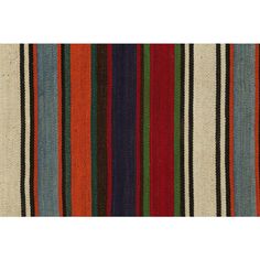 a multicolored rug with vertical stripes