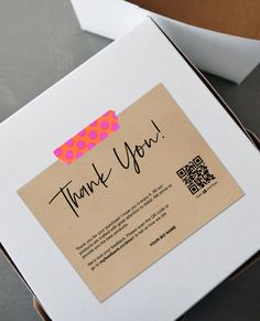 a box that has some kind of thank you note in it's bottom corner