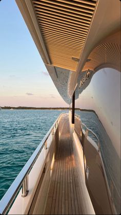 the back end of a boat with water in the background