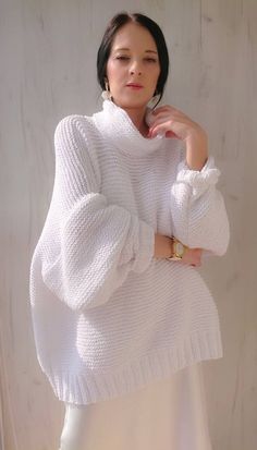 Oversized chunky knit cotton sweater. Handmade cotton turtleneck. Hand knit cowl neck sweater for women. Chunky oversized turtleneck sweater in cotton Size XL in white color Length 53 cm READY TO SHIP Yarn: cotton Color (as shown): 62 white SIZE CHART Size S: Width: 55 cm  Length: 60-62 cm Size M: Width: 60 cm Length: 60-62 cm Size L: Width: 65 cm Length: 61-63 cm Size XL: Width: 70 cm Length: 62-65 cm Cotton Turtleneck, Sweater Handmade, White Turtleneck Sweater, Sweater Chunky, Oversized Turtleneck Sweater, Oversized Turtleneck, White Turtleneck, Sweater Oversized, Sweater Oversize