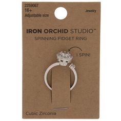 With this Cubic Zirconia Spinning Fidget Ring, your outfit has a fun fidget twist! This open, adjustable ring has a simple metallic base with a small stone on the end where the ring bends. The focal stone has a sparkling cluster of cubic zirconia stones. Plus, when you twist the focal, you'll find that it spins freely! This ring doubles as both a stylish accessory and an engaging fidget toy. Details: 	 Size: One Size Fits Most 	 Material: Metal & Cubic Zirconia 	 Metal Color: Silver 	 Quantity: Diy Wire Fidget Rings, Daughter Fidget Ring, Fidget Rings Jewelry Walmart, Spinny Fidget Ring, Adjustable Fidgit Rings, Diy Fidget Toys, Spinning Rings, Dream Wedding Ring, Fidget Rings