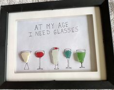 four glasses are in a shadow frame with the words at my age, i need glasses