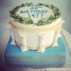 a birthday cake that is on top of a blue and white book with the words happy 24 th birthday jeff