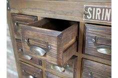 An elegant fir wood apothecary cabinet with multiple drawers and a hidden storage cupboard disguised as small drawers. Metal name tags on each drawer gives a retro sentiment. Perfect for all vintage furniture lovers. H: 145cm W: 85cm D: 34cm Weight 23kg Storage With Drawers, Metal Name Tags, Rustic Sideboard, Storage Cupboard, Aged Wood, Apothecary Cabinet, Loft Interiors, Large Cabinet, Aging Wood