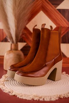 Rock your 70's vibes with these chestnut platform sock booties! Pair with your favorite dress or flares for the fun and flirty 70's style. Fit: True to size. If you have a wide foot, size up 1/2 size.Heel Height: 4"Brand: Vintage Havana Elopement Outfit Ideas, 1970s Shoes, Elopement Outfit, 70s Shoes, Sock Boot, Sock Booties, 70s Vibes, 70s Disco, New Aesthetic