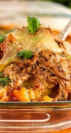 a close up of a casserole dish with meat and vegetables