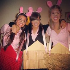 three girls in bunny ears are posing for the camera