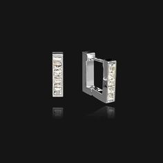 Introducing our stunning square huggie hoop earrings, embellished in clear rhinestones. Exclusively designed as a minimal yet statement accessory, comprised of quality, water-resistant 18k plated stainless steel. Also available in a larger size (22mm) and gold. Please note we do not accept exchanges or returns on earrings for hygiene reasons. MATERIALS: Base: Hypoallergenic nickel free 316L stainless steel. Plating: Genuine 18k silver plated. Stones: Cubic Zirconia SIZING Earring diameter: 12mm Square Hoop Earrings, Hoop Earrings Silver, Tiny Hoop Earrings, Crystal Hoop Earrings, Waterproof Jewelry, Earrings Crystal, Huggie Earrings, Huggie Hoop Earrings, Silver Rhinestone