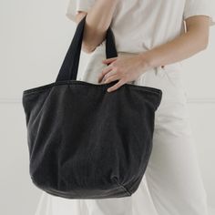 Diso This Baggu Black Washed Denim Canvas Tote Bag!!! It’s An Older Style With A Similar Look To A Mini Cloud Bag That Has An Inner Pocket, Zipper Closure And Thick Straps - Willing To Purchase Or I Have Other Baggu Items Uft Black Cotton Canvas Bag For On-the-go, Casual Black Canvas Bag For On-the-go, Black Denim Travel Bag, Versatile Denim Bag, Denim Bag For Everyday, Black Denim Travel Shoulder Bag, Chic Black Canvas Bag For On-the-go, Versatile Everyday Denim Bag, Casual Everyday Denim Bag