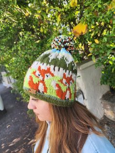 🦊🌲 Embrace the Enchantment: Handmade Fox and Forest Bobble Beanie 🌲🦊 Step into a winter wonderland with our enchanting handmade bobble beanie, where the spirit of the forest meets the playful charm of a fox. This unique accessory is more than just a beanie; it's a statement piece that captures the magic of winter and the beauty of nature. Key Features: 🍂 Fox-Inspired Elegance: Our carefully crafted bobble beanie showcases a whimsical fox design, bringing a touch of woodland magic to your wi Whimsical Crochet Hat For Winter, Whimsical Winter Crochet Hat One Size, Whimsical Winter Crochet Hat, Whimsical One Size Crochet Hat For Winter, Playful Winter Beanie, Whimsical Hand Knitted Beanie Bonnet, Whimsical One Size Bonnet For Winter, Whimsical Winter Bonnet, One Size, Whimsical Hand-knitted Beanie Bonnet