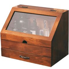 a wooden box with some bottles in it and one drawer open to show the contents