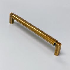 an old brass door handle on a white background