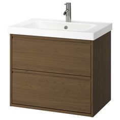 a bathroom vanity with two drawers and a faucet on the top, in walnut