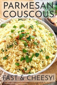 parmesan couscous in a white bowl with green onions