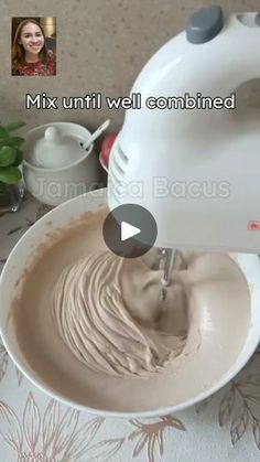 a mixer is being used to make whipped cream