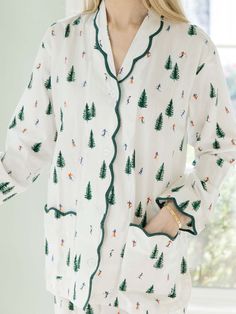 Did you know the average woman spends nearly 26 years of her life in bed? Make every one of those nights count with my flattering 2-piece ski print pajama set, designed for the ultimate beauty rest this holiday season. Handcrafted by skilled artisans, each set features exquisite hand-block printing on 100% soft, lightweight cotton. The straight-fit design, adorned with elegant scalloped edges, gives you a flattering, feminine look without being constricting — so you stay cool and comfortable all Pajamas Chrsimtas Outdoor Minicouple, Gray Bear Isle Pajamas, Luxury Winter Cotton Sets, Christmas Pajama Set Target, Cmas Pajamas, Luxury Green Summer Pant Set, Yellowstone Christmas Pajamas, Beige Christmas Pajamas, Ski Pajama Pants