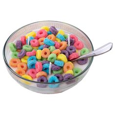 a glass bowl filled with lots of colorful cereal