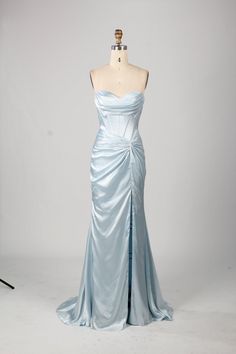 Get ready to turn heads at Prom 2024 with the Kiya Strapless Sky Blue Satin Fitted Prom Dress by Jessica Stuart! This stunning dress features a playful strapless design and a bold teal color that will make you stand out from the crowd. Perfect for a night of fun and unforgettable memories. High Leg Split Lace up Back Strapless Available in Sky Blue or Teal Silk Dresses For Prom, Ice Blue Formal Dress, Wrap Prom Dress, Colourful Prom Dress, Light Blue Prom Dress Aesthetic, Where To Get Prom Dresses, Silk Prom Dresses, Night Prom Dress, Basic Long Dress