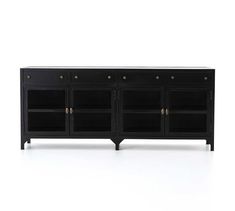 the sideboard is black and has three doors on each side, with brass knobs