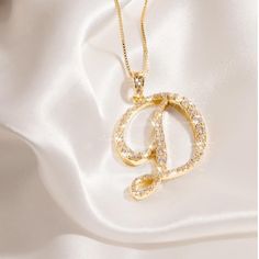 Gold Rhinestone Initial Necklaces With A Lobster Clasp Closure. Cz (Cubic Zirconia) Pave Pendent Necklace With A Fully Embellished Letter. All Rhinestones Are Intact. Necklace Length Measurement 18.5”-21”. More Letters Available!!! Doesn’t Come In A Box. ***Also Available In Silver*** Approx Length: 22 Made In Korea D Necklace Initial, D Initial Necklace, Letter D Necklace, D Necklace, D Initial, Initial Necklaces, Length Measurement, Gold Letter, Pendent Necklace