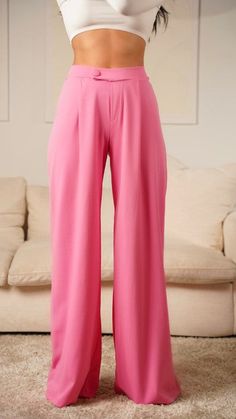 Make a statement in these pink asymmetrical high-waisted trouser pants. These modern-style dress pants feature an asymmetrical cut for a unique look. Crafted from high quality material, these pants are designed to offer both comfort and style. Elevate any outfit with these distinctive trousers. Fabric & fit: 96% POLYESTER 4% SPANDEX Model is wearing size Small. Pink Wide Leg Pants For Loungewear, Pink Wide Leg Loungewear Pants, Pink High Waist Non-stretch Pants, Chic Pink Wide Leg Loungewear Pants, Non-stretch High Waist Pink Pants, Elegant Pink High-waisted Wide Leg Pants, Elegant High-waisted Pink Wide Leg Pants, Chic Pink Loungewear Pants, High Waist Non-stretch Pink Pants