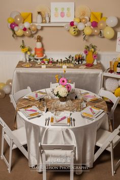 a table set up for a birthday party