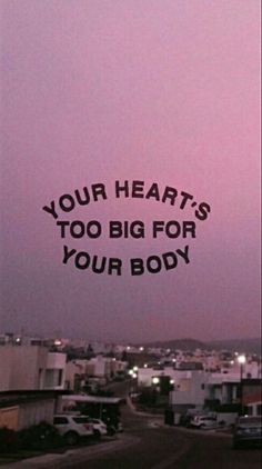 an advertisement with the words your hearts'too big for your body in front of a cityscape