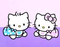 two hello kitty dolls sitting next to each other on a purple and pink background with polka dots