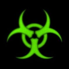 a green biohazard sign on a black background