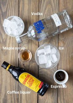 ingredients to make an ice cube drink on a wooden table