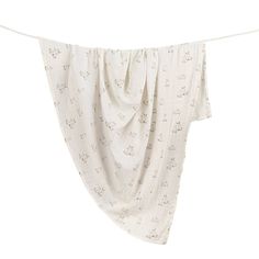 a white cloth hanging from a clothes line