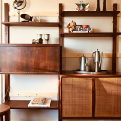 a wooden shelf with various items on it