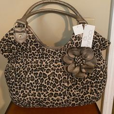 Elevate Your Style With This Stunning Minicci Leopard Print Purse. Made For The Fashion-Forward Woman, This Accessory Is Perfect For Adding A Touch Of Glamour To Any Outfit. The Purse Features The Iconic Minicci Brand, And Is Designed To Appeal To Those Who Love Unique And Stylish Accessories. Thrift Board, Printed Purse, Pretty Bags, Stylish Accessories, Room Interior, Fitness Inspo, Cute Icons, Dream Wardrobe, Fit Inspo