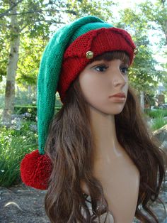 a female mannequin head wearing a knitted hat