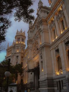 an ornate building lit up at night