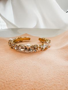 This beautiful bracelet features a jeweled cuff adorned with crystals and pearls. one size, gold finish Crystal Cuff Bracelet, Chesapeake Va, Special Occasion Jewelry, Wedding Jewelry Bracelets, Rhinestone Jewelry, Wedding Bracelet, Beautiful Bracelet, Formal Wear, Gold Finish