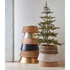 three different types of baskets with a christmas tree in the middle