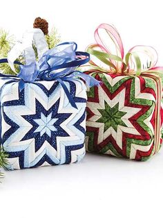 three wrapped presents with ribbons and bows